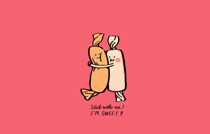 On a pink background, two smiling wrapped caramels hug each other. Caption reads: 'Stick with me! I'M SWEET!!'